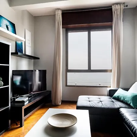 アパート Gran En Primera Linea De Playa ヒホン